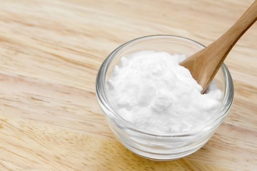 Baking soda or Sodium bicarbonate on wooden table