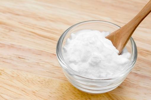 Baking soda or Sodium bicarbonate on wooden table