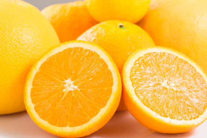 Close up view of orange on white background.
